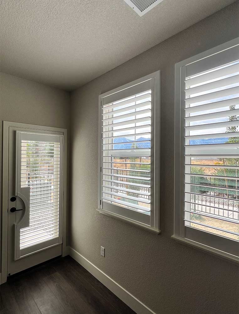 Glass door and double window with shutters